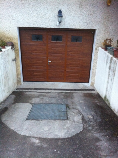 Porte de garage sectionnelle avec portillon